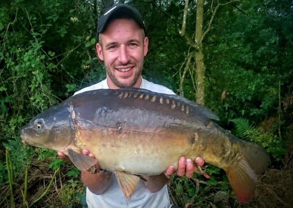 Adam Price with one of his 4 fish out of 20lb from Beattie's lake  using krill