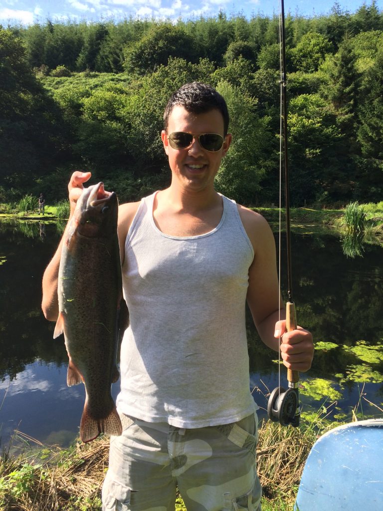 James Thomas with a 3lb 10oz rainbow