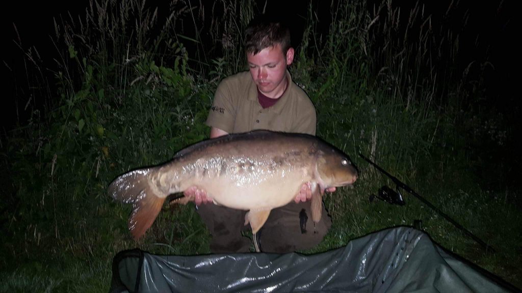 Danny Hayman  with one of his catches from Beattie's lake a 26lb 8oz using cell over a area of cell & pellet. 