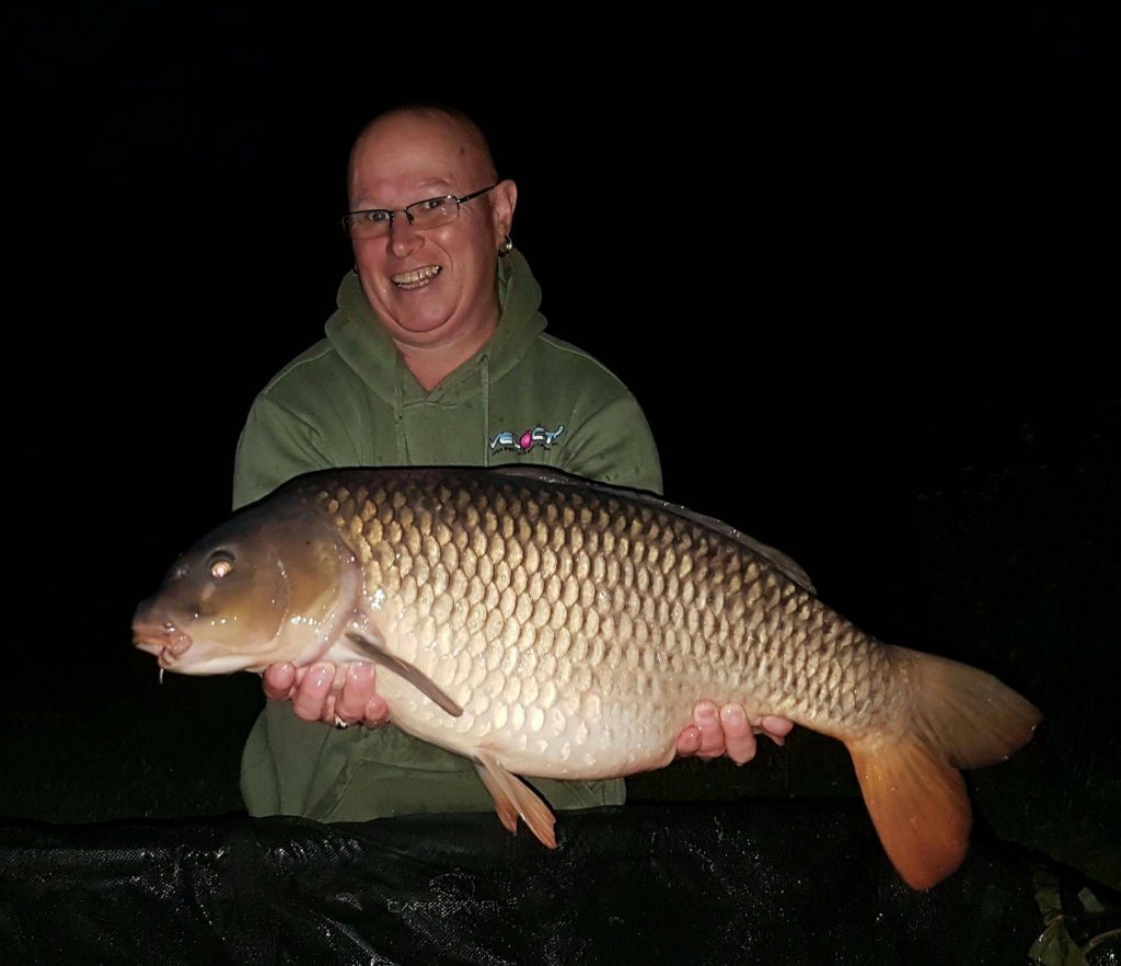 Inch Morgan with one of his many catches from the summerhouse swim on Beattie's lake using sticky baits krill boilies here is his 20lb common (just one of his catches ) 